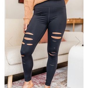 Black ripped leggings new with tag.